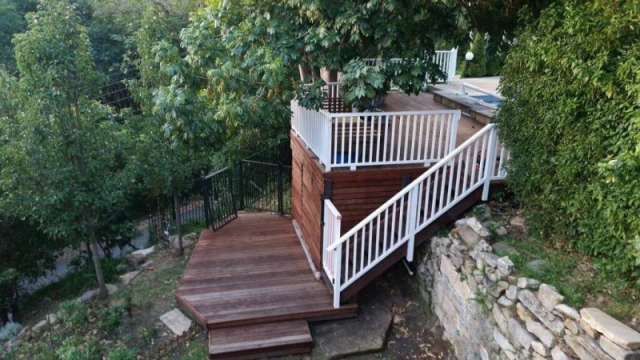 Wooden deck and stairs with railing